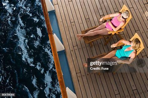 29,027 Young Women Sunbathing Stock Photos & High